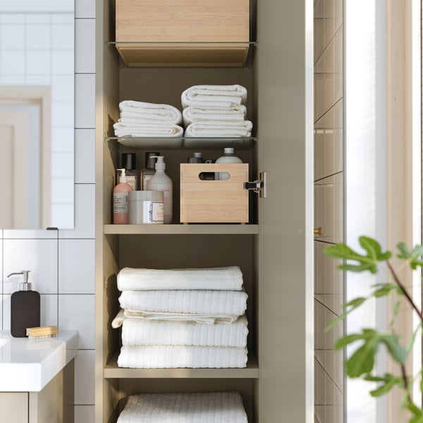 A beige HAVBÄCK high cabinet with door