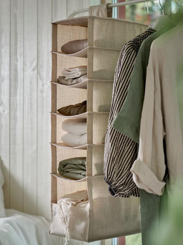 A textile/beige PURRPINGLA hanging storage w 6 compartments