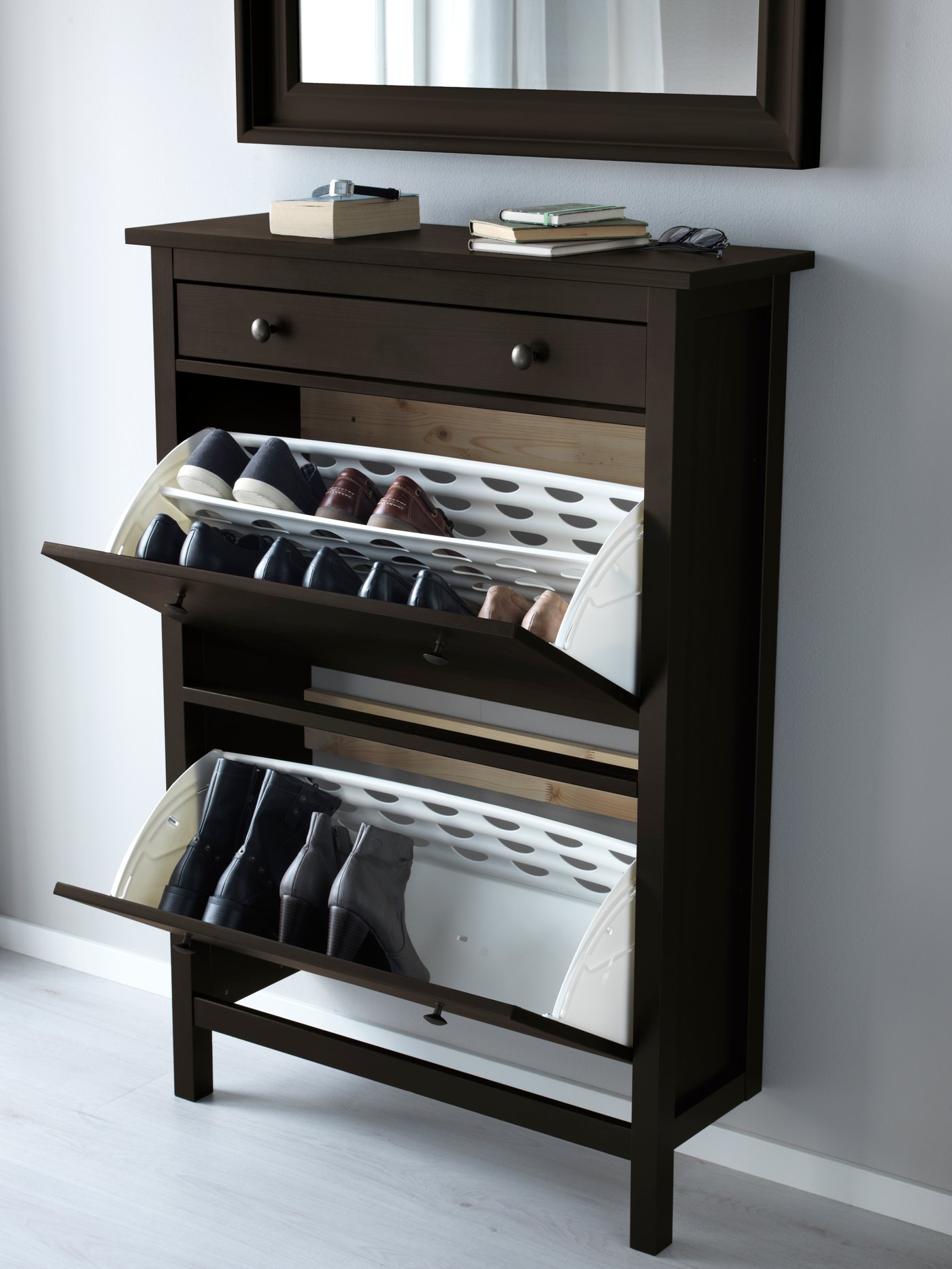 A black-brown HEMNES shoe cabinet with 2 compartments