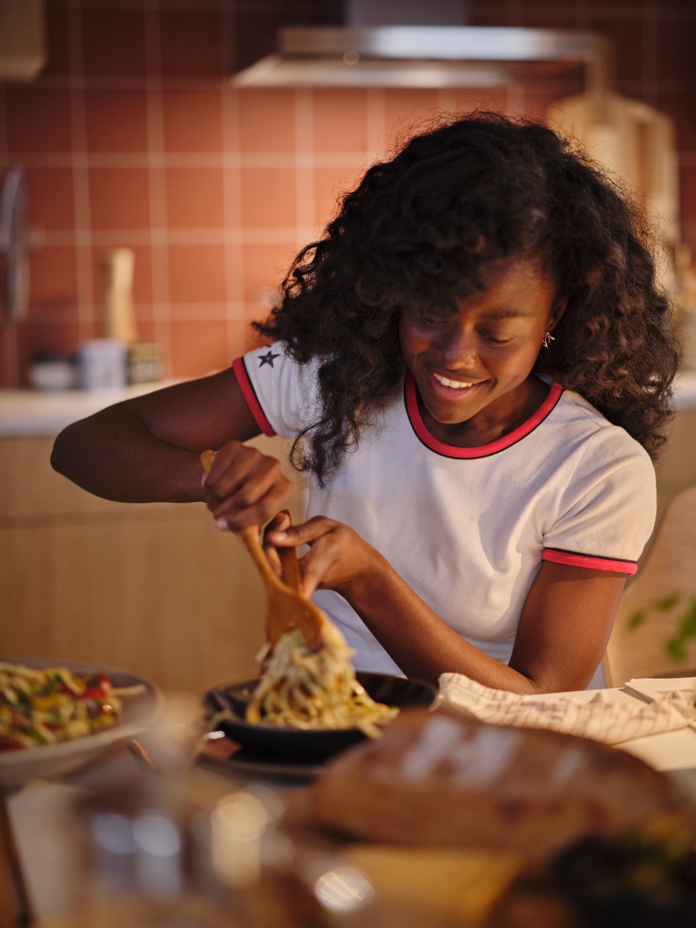 A round/beech RÖRT spoon in the dining room
