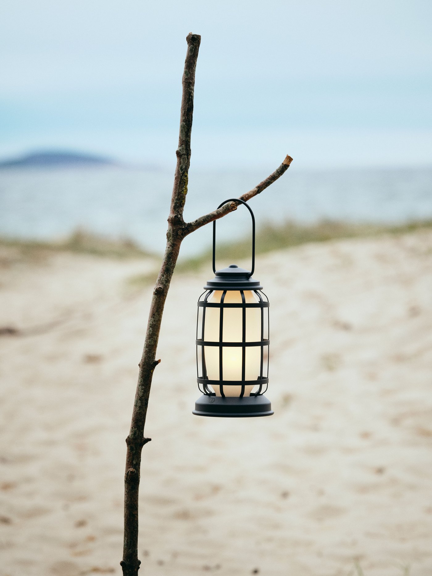 An outdoor battery-operated/dimmable SOLUPPGÅNG LED lantern
