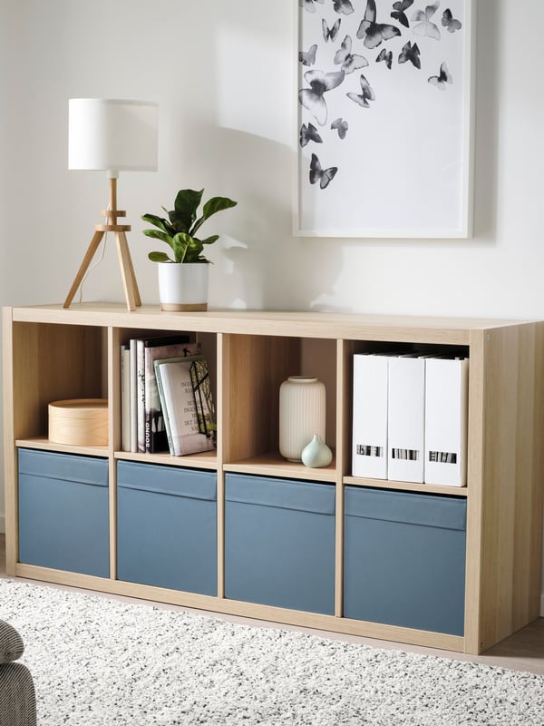A white stained oak effect KALLAX shelving unit
