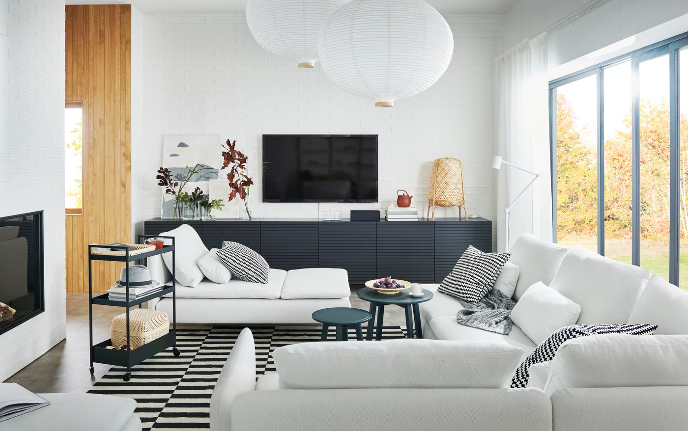 An onion shape/white RISBYN pendant lampshade in the living room