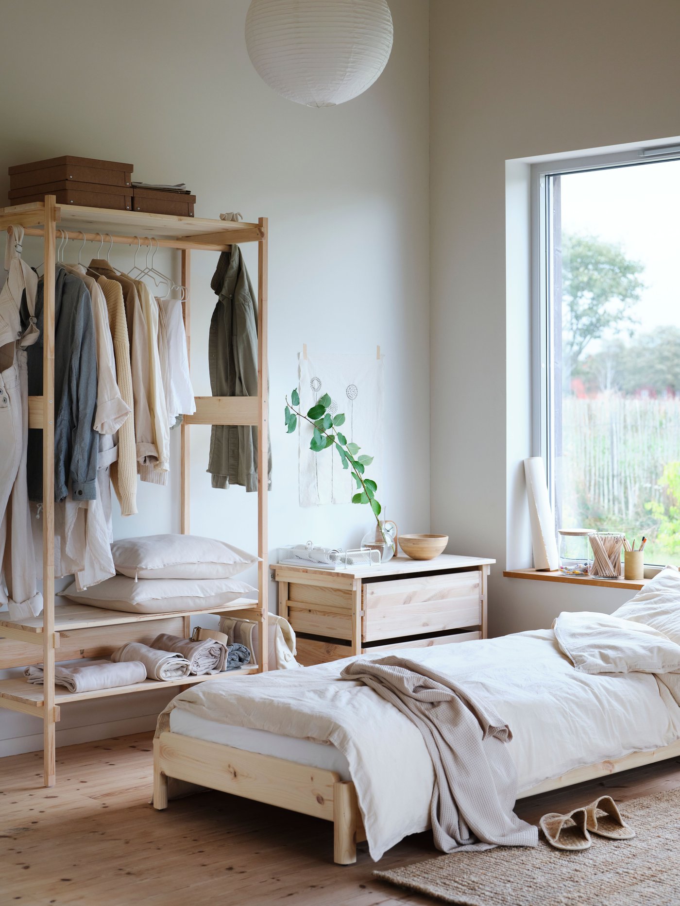A pine UTÅKER stackable bed in the bedroom