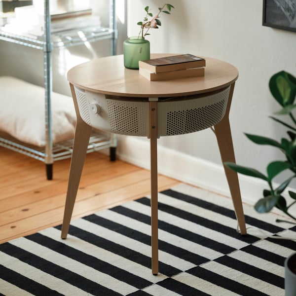 A stained oak veneer/white smart STARKVIND table with air purifier