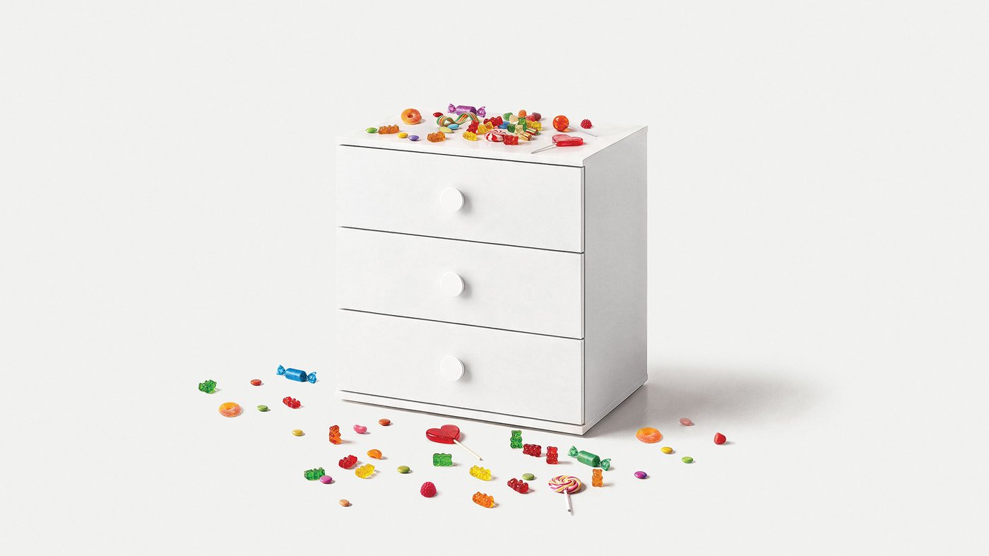 a GODISHUS chest of drawers with candy on top