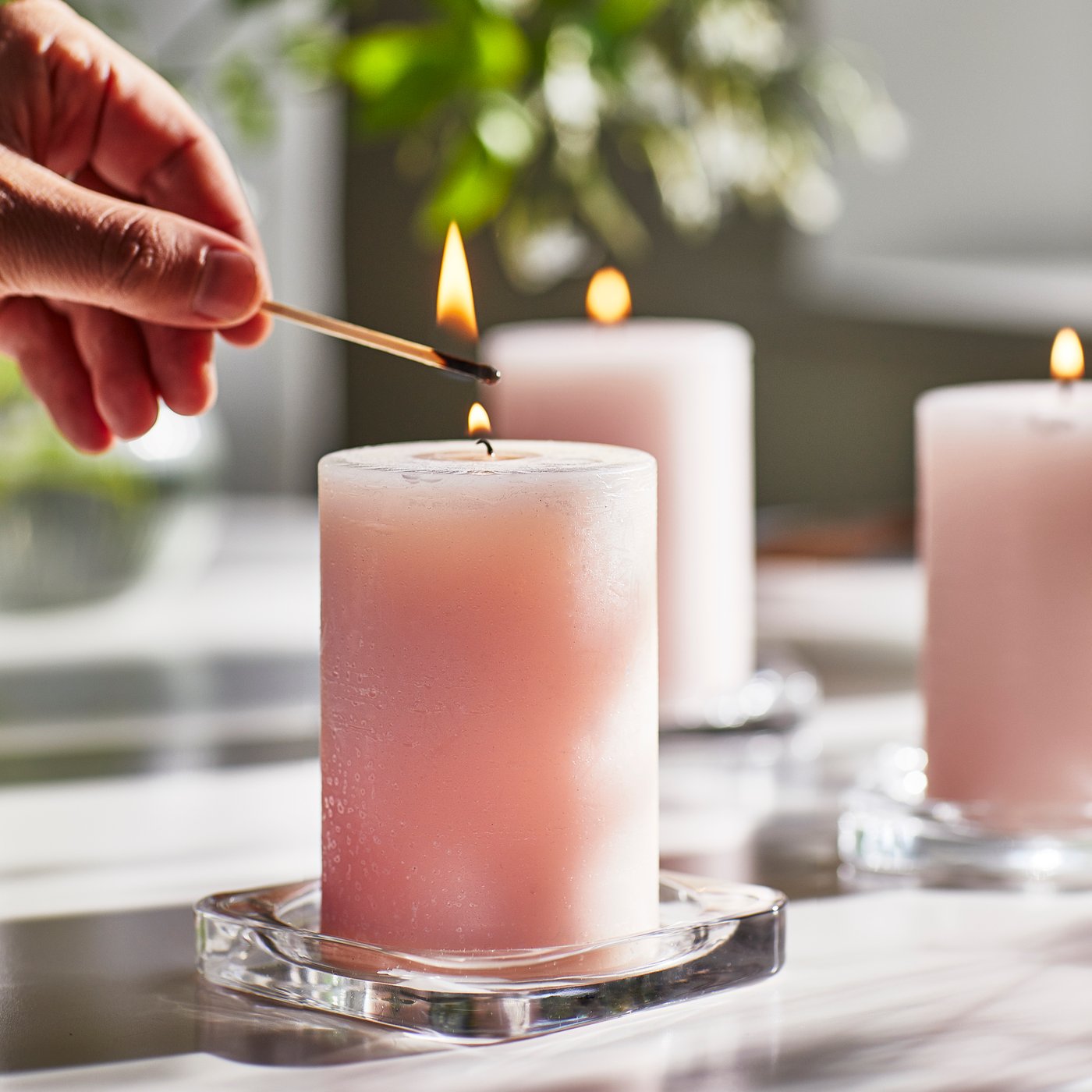 A Jasmine/pink LUGNARE scented pillar candle
