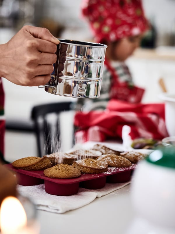 A stainless steel IDEALISK flour sifter in the kitchen