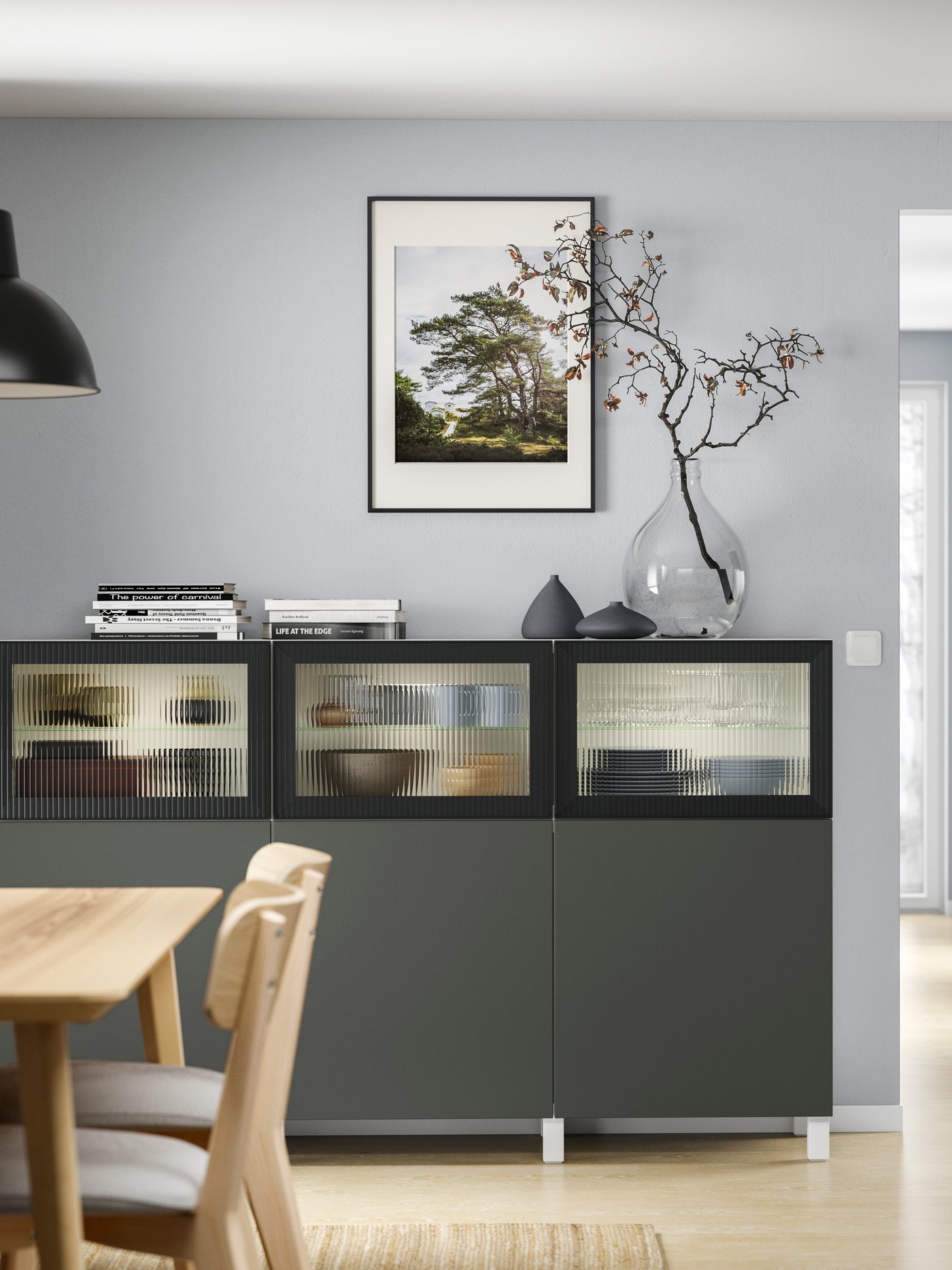 A white Lappviken/Fällsvik dark grey BESTÅ storage combination with doors