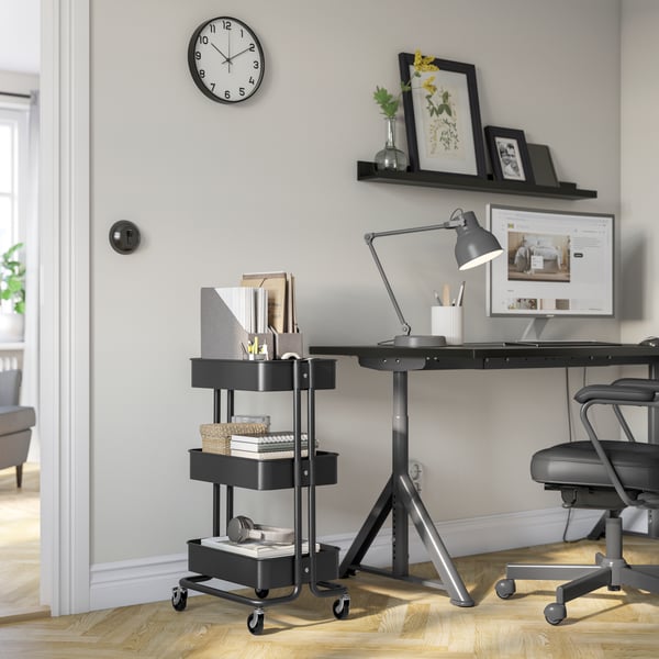 A black RÅSKOG trolley