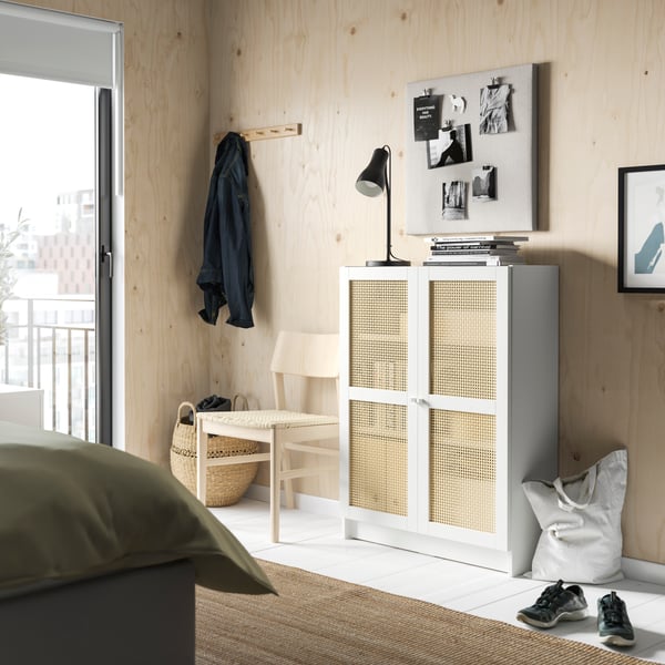 A white BILLY bookcase with doors