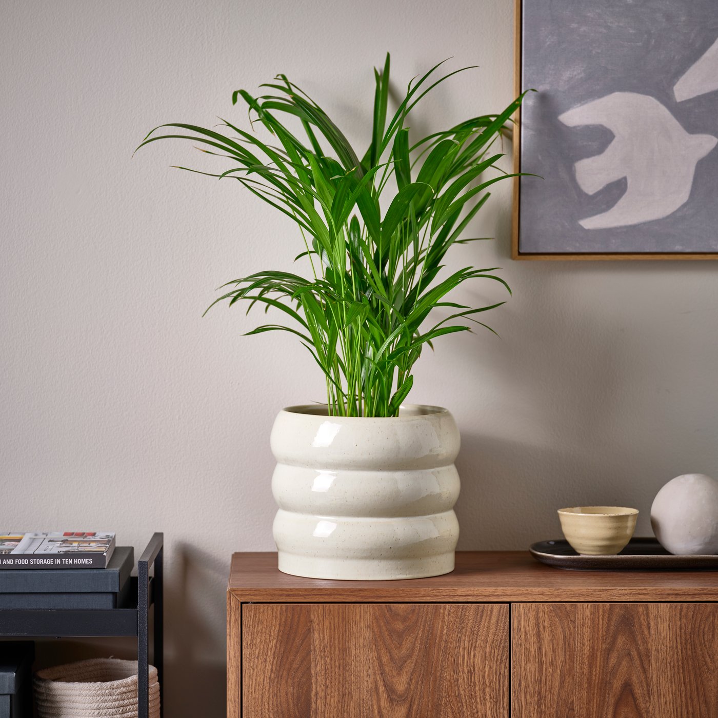 An in/outdoor/beige HASSELBUKETT plant pot