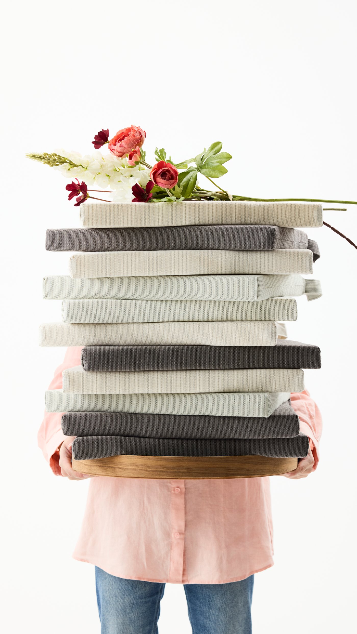 A light green JUSTINA chair pad