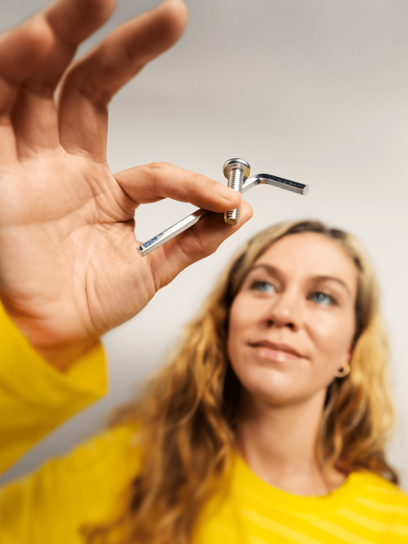 Co worker holding spare parts