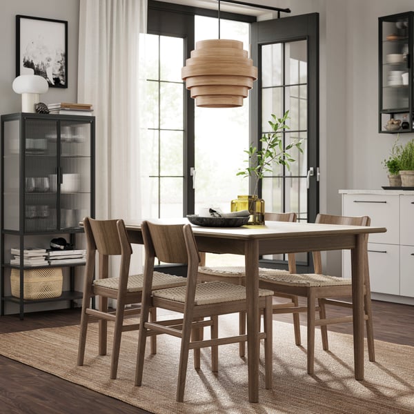 A brown beech/brown beech SKANSNÄS table and 4 chairs