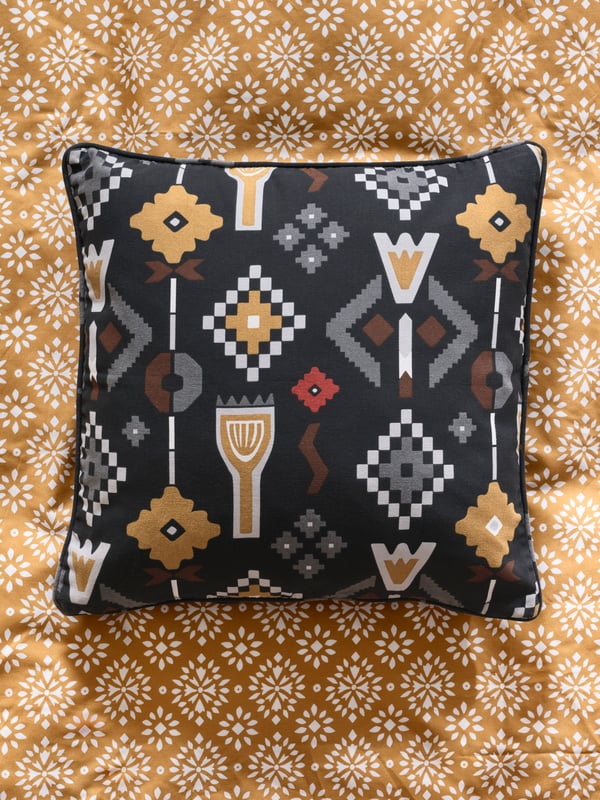 An yellow-beige/white ORMÄNGSFLY duvet cover and pillowcase