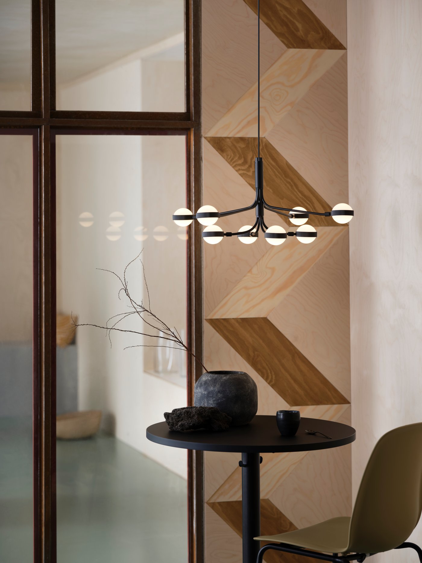 A black/white STORSLINGA LED chandelier, 8-armed