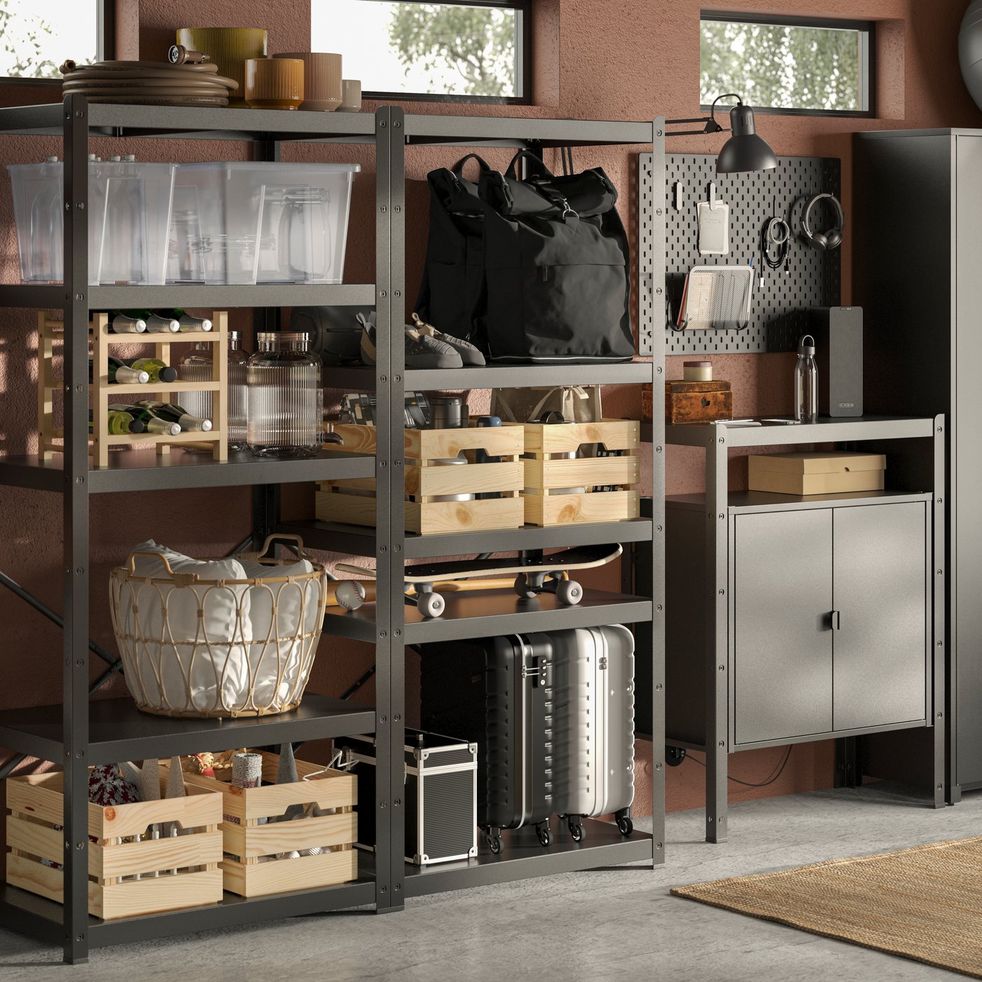 A neatly arranged garage wall with equipment and accessories in KNAGGLIG and SAMLA boxes in a BROR storage combination.