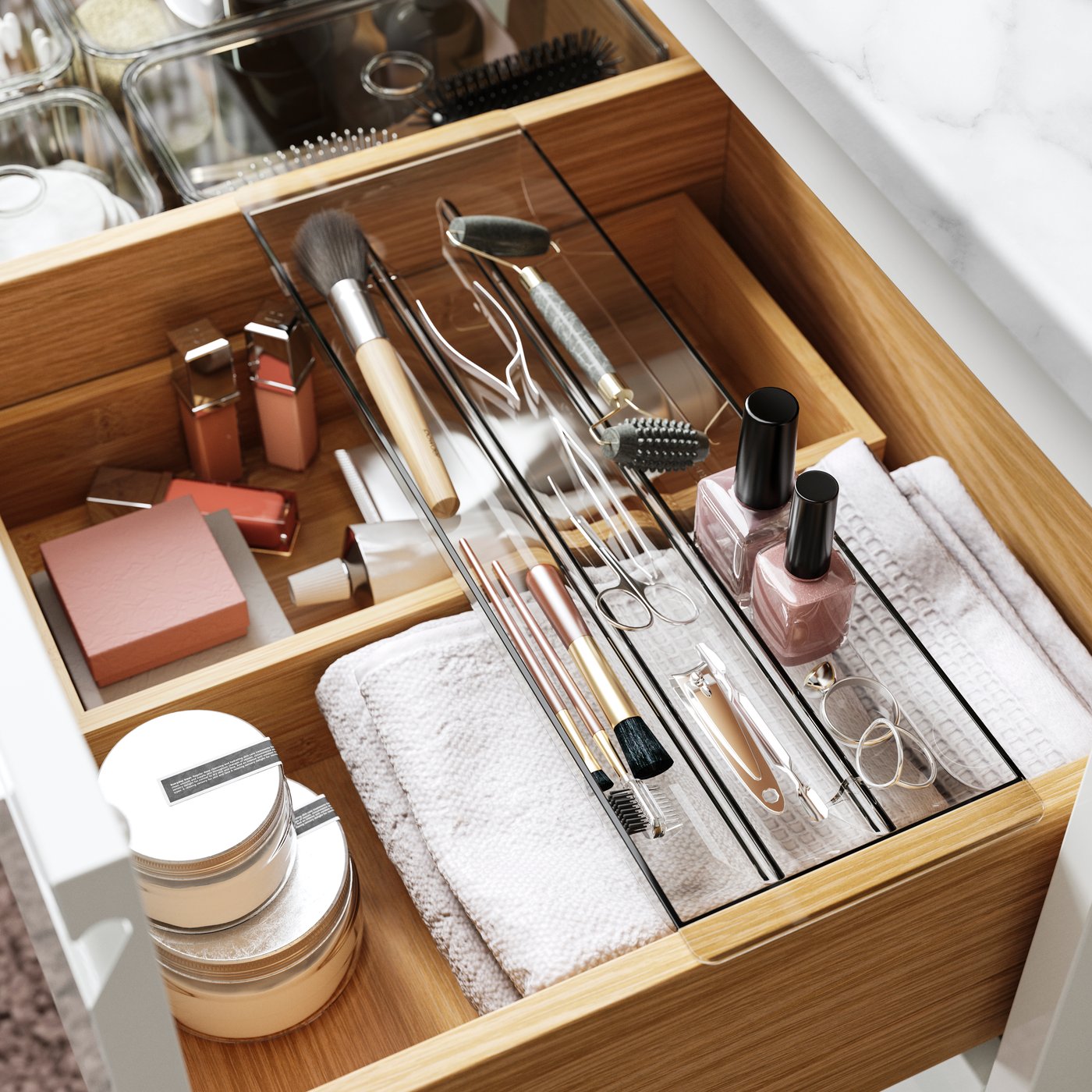 A grey VISSLAÅN drawer organiser