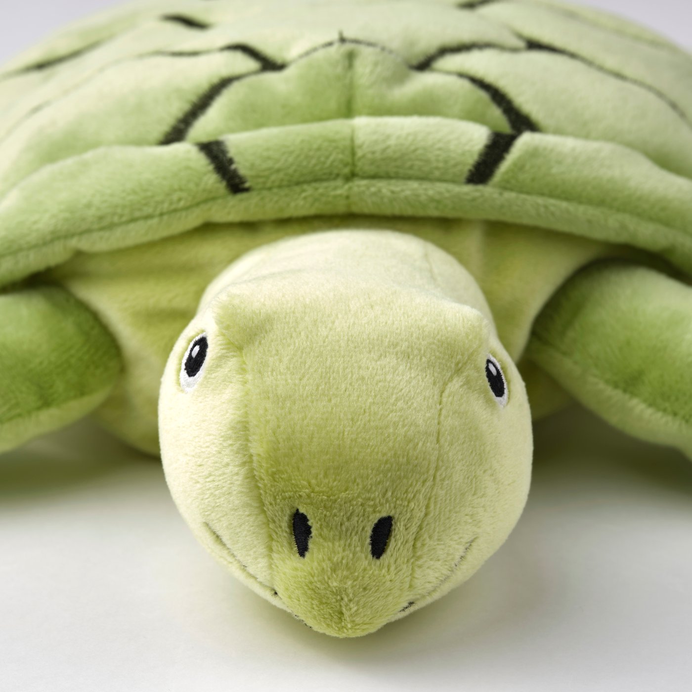 A turtle/green BLÅVINGAD soft toy
