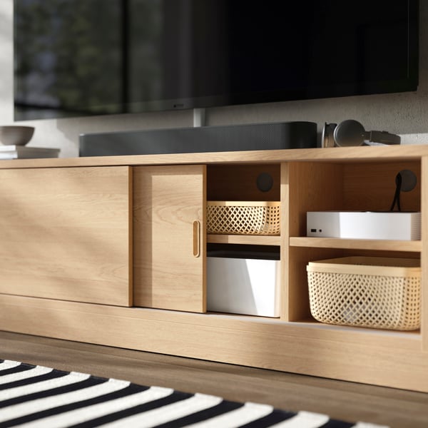 An oak veneer TONSTAD TV bench
