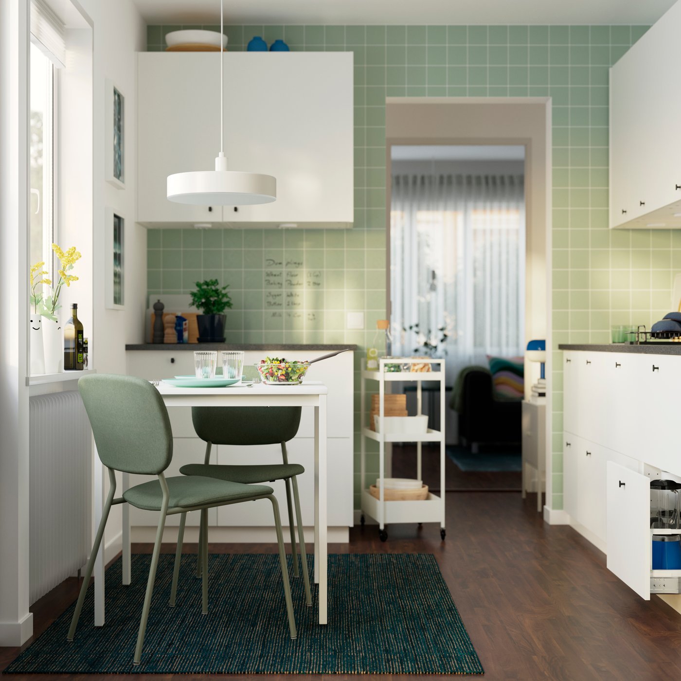 A white white/green Tibbleby grey-green VIHALS table and 2 chairs