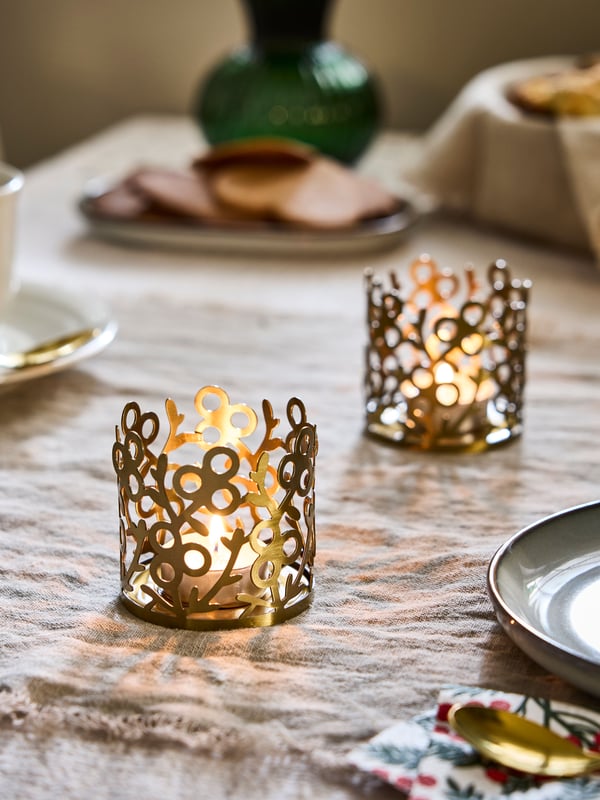 A gold-colour VINTERFINT tealight holder