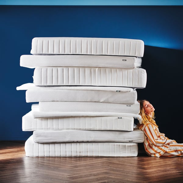 A white NISSEHOLM mattress pad