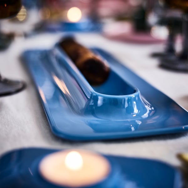 A blue VINTERFINT serving plate