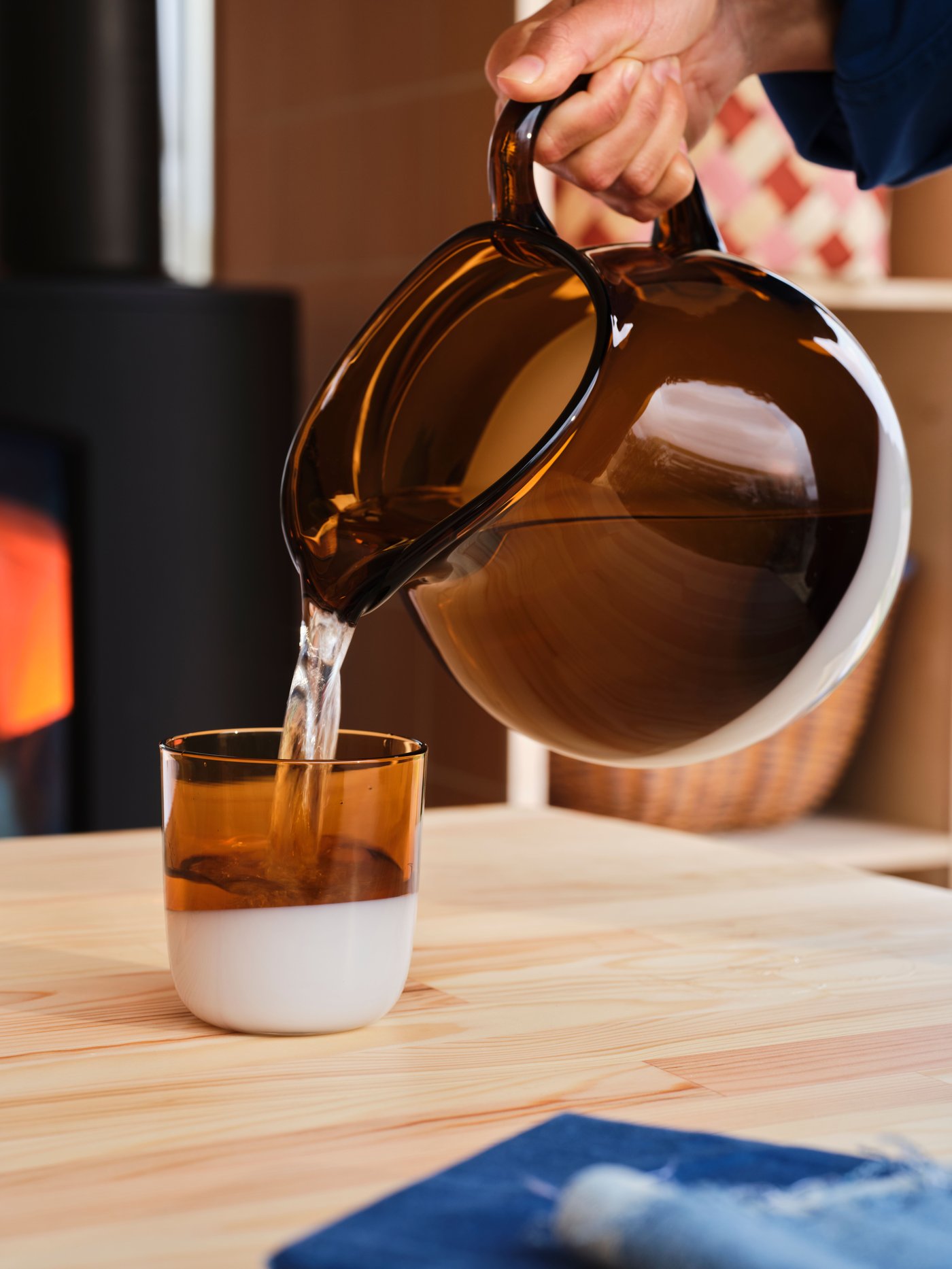 A brown OMMJÄNGE glass in the kitchen