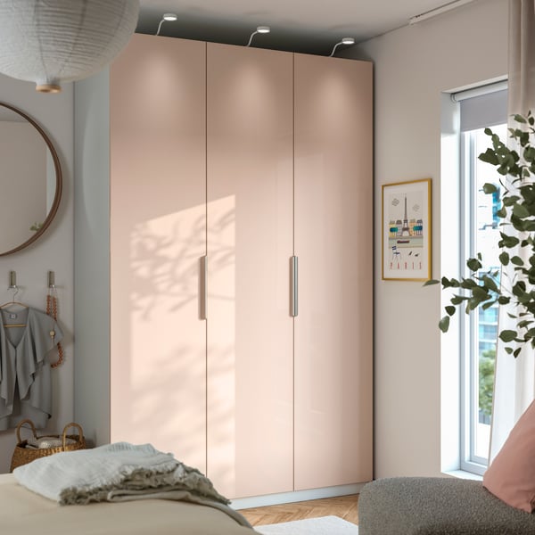 A white/high-gloss light orange FARDAL wardrobe combination