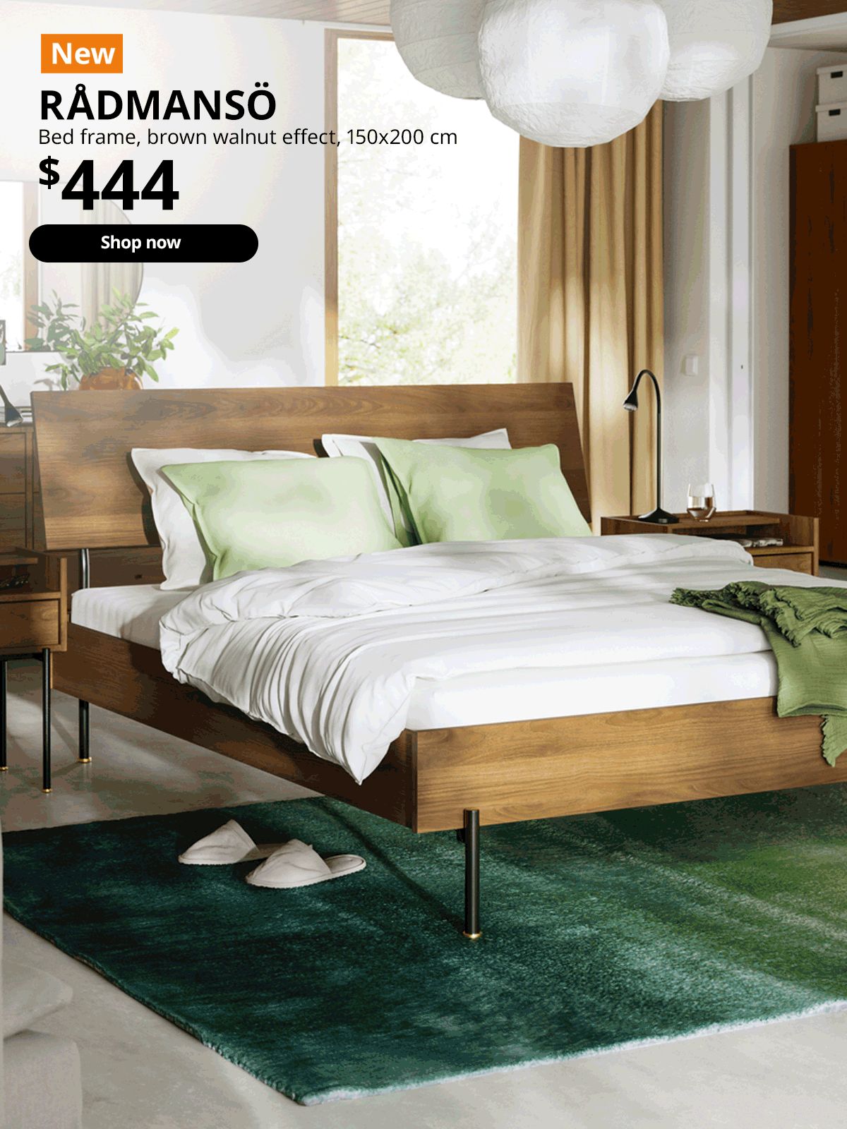 A brown walnut-effect RÅDMANSÖ bedside table and bed in a modern bedroom.