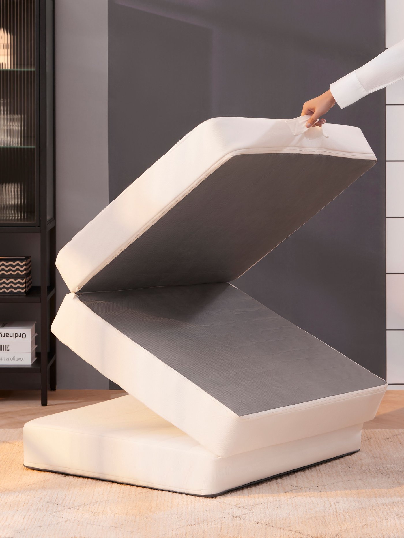 An extra firm/Vissle grey VITHÄLL mattress/pouffe in the NA