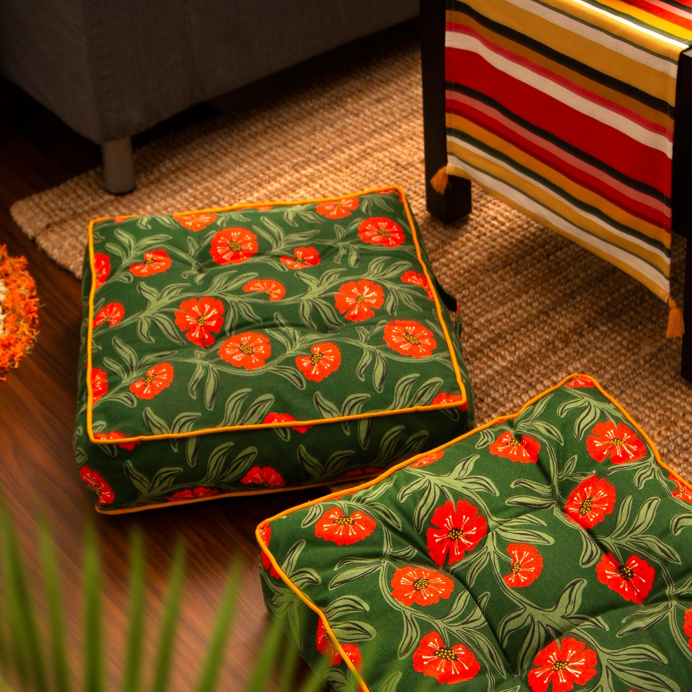 A floral pattern AROMATISK floor cushion