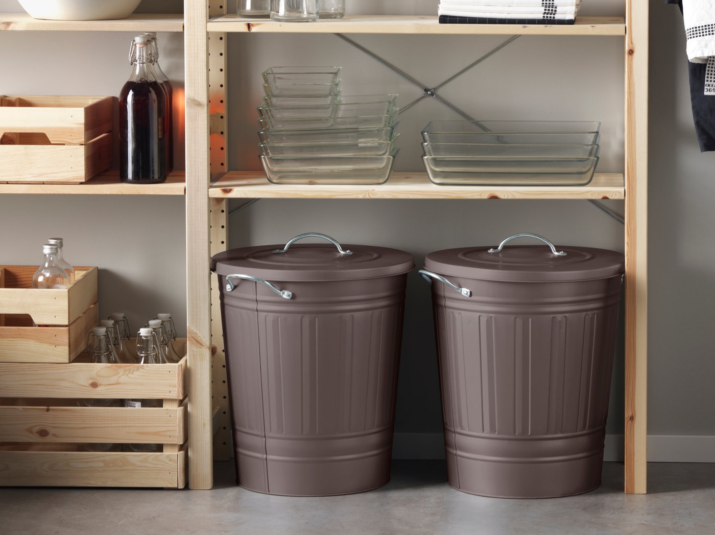 A grey KNODD bin with lid