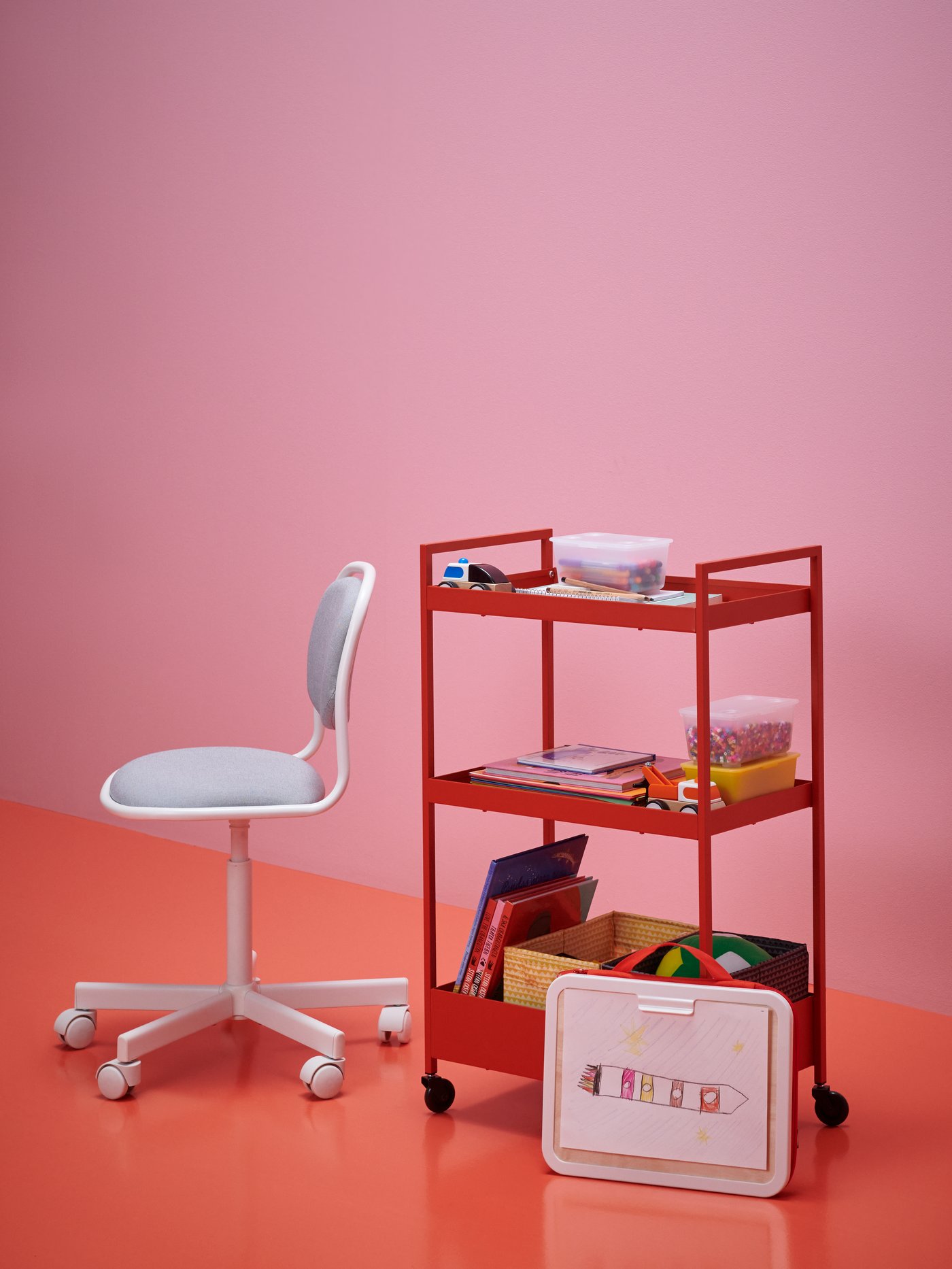 A white/Vissle light grey ÖRFJÄLL children's desk chair in the childrens room
