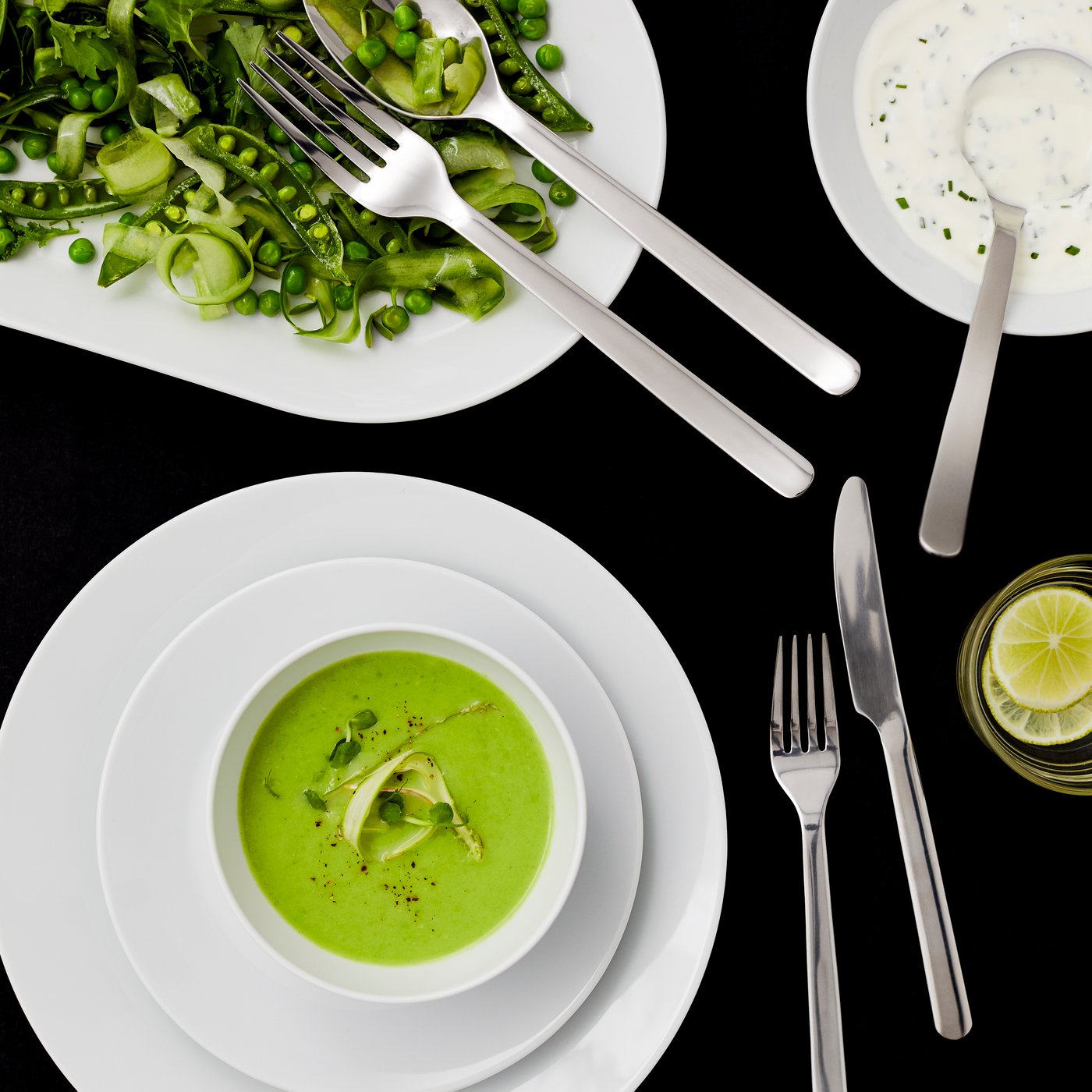 A stainless steel IKEA 365+ 4-piece serving set