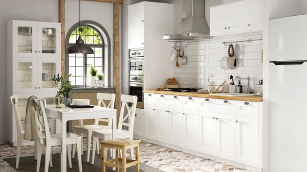 A linear IKEA kitchen with AXSTAD white door fronts.