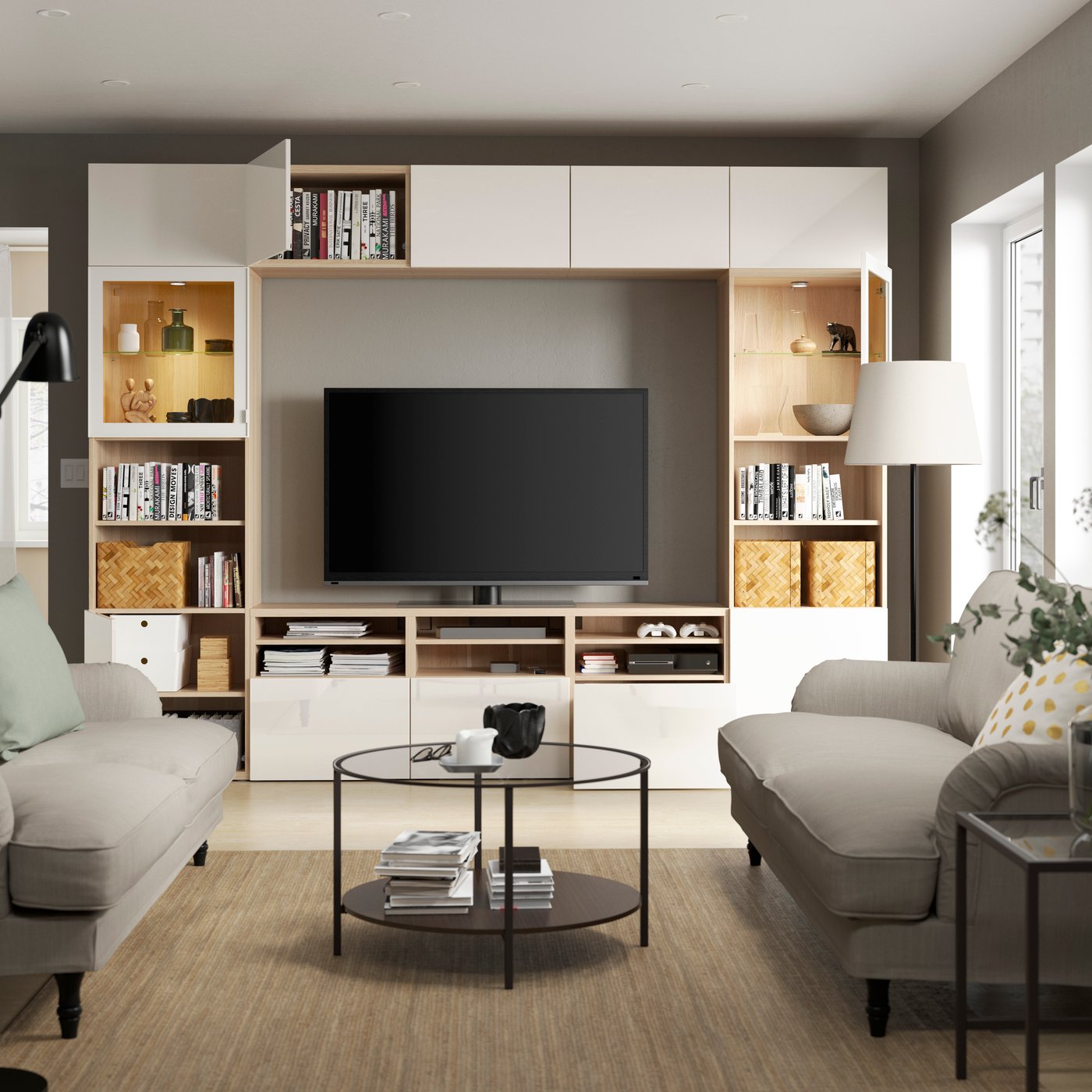 A complete BESTÅ media combination with open cabinets, cabinets with doors and wall-mounted BESTÅ combinations.