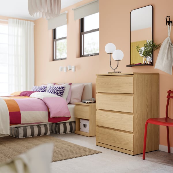 An oak effect STORKLINTA chest of 4 drawers