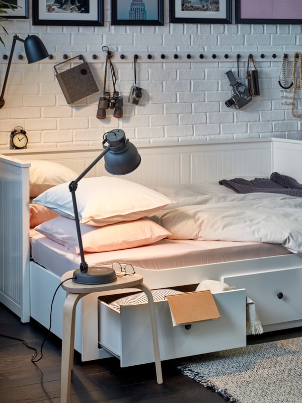 A black ENEBY bluetooth speaker in the bedroom