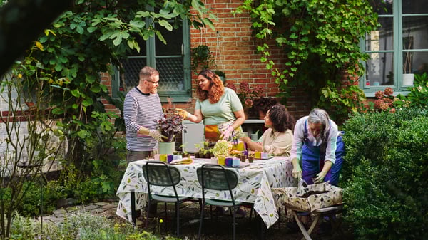 A dark green/light grey SEGERÖN table, outdoor