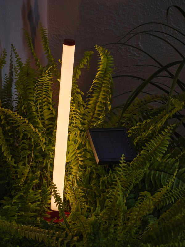 A red SOLVINDEN solar-powered ground stick