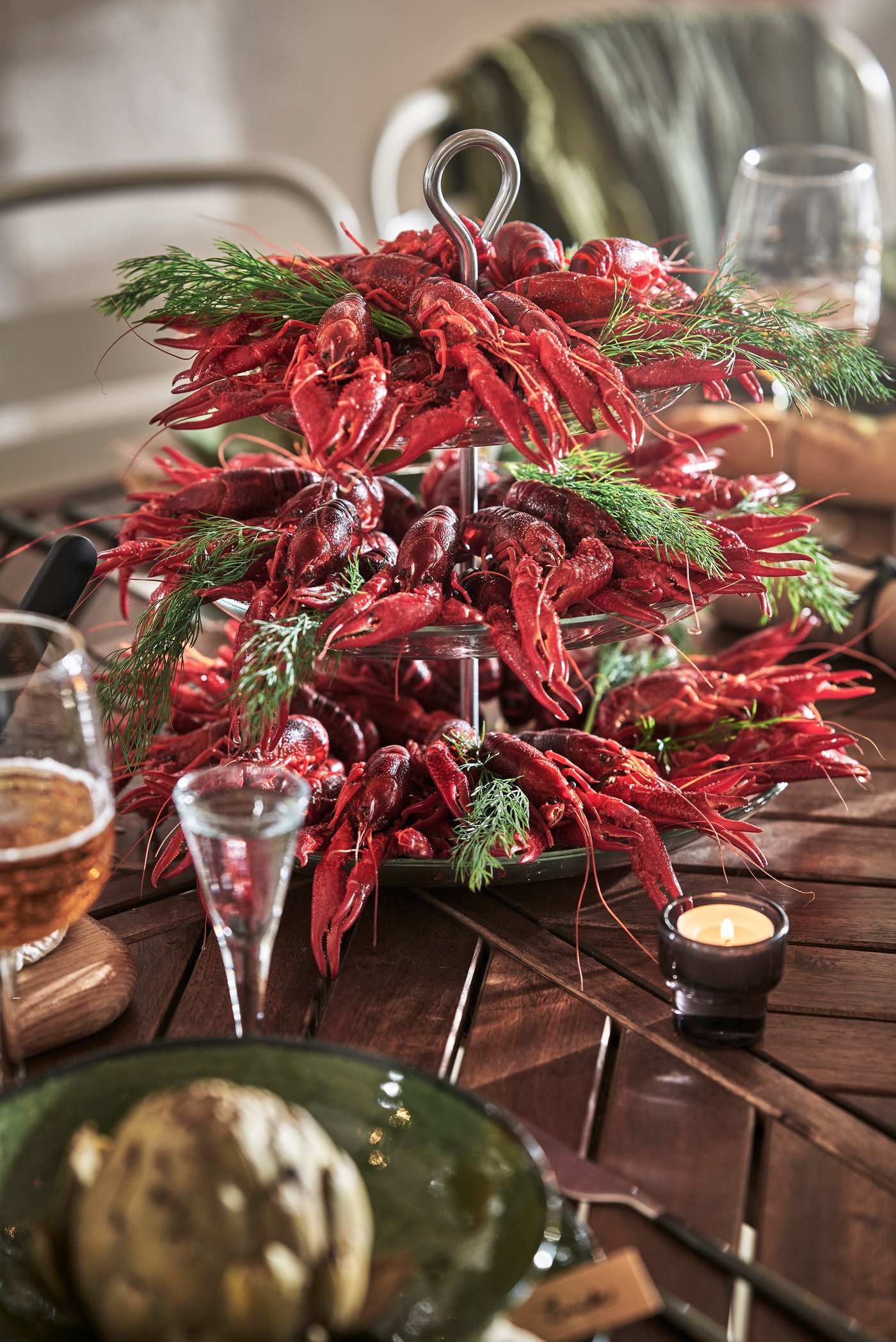 A clear glass/stainless steel KVITTERA serving stand, three tiers