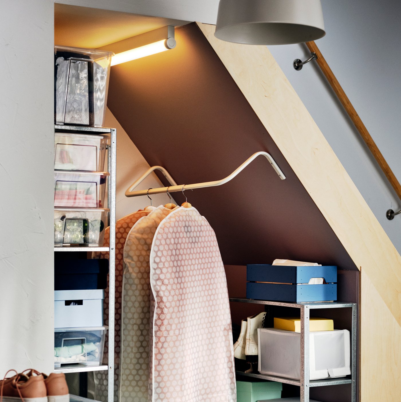 A fabric striped/white/grey HEMMAFIXARE shoe box in the hallway