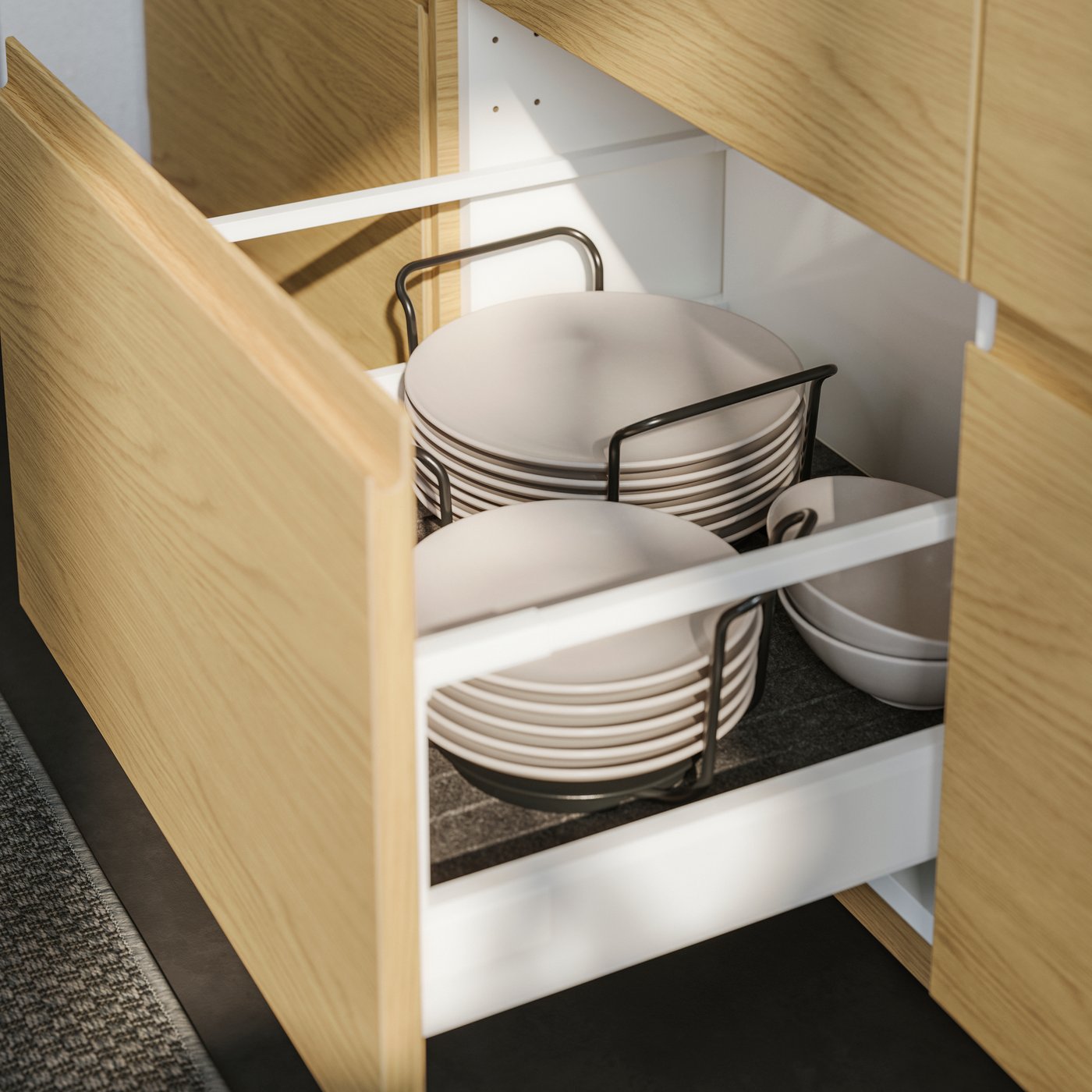 A grey UPPDATERA drawer mat in the kitchen