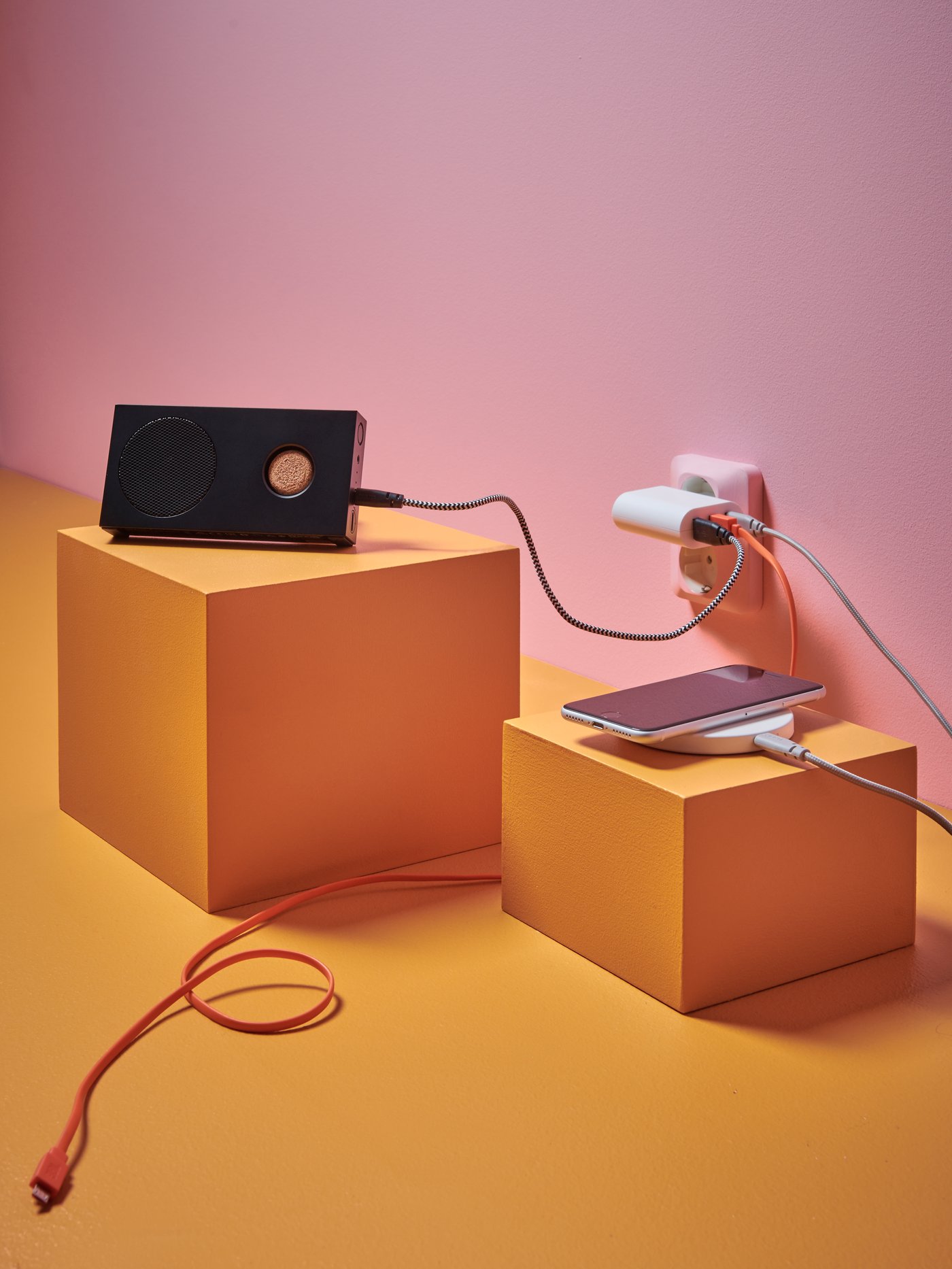 A black ENEBY portable bluetooth speaker in the home office