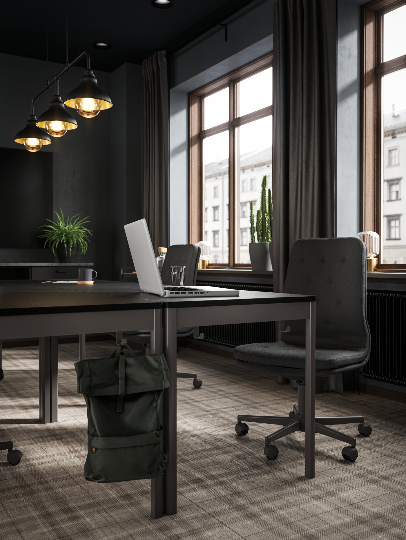 An olive-green DRÖMSÄCK backpack