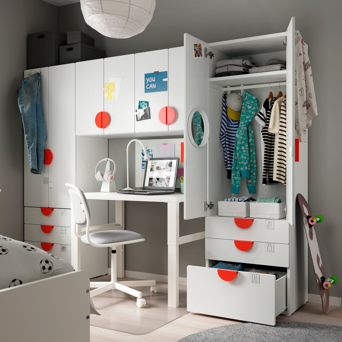 A white/white PLATSA storage combination with a desk in the middle of two cabinets and even storage space above the desk
