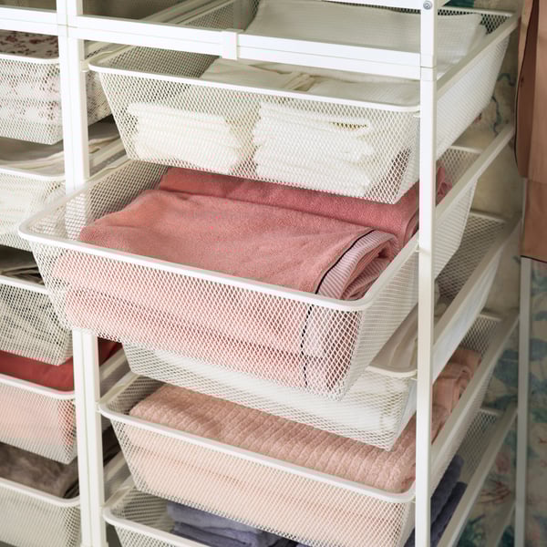 A white JONAXEL open storage combination